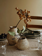Two Broste Copenhagen Alma Ceramic Vases on dining table