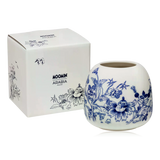 Blue & white ceramic Arabia Moomin vase with floral pattern with white gift box on a white background