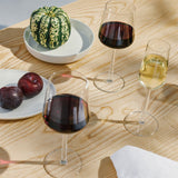 Table setting with clear Essence wine glasses by Iittala Finland