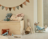 plush sleeping bunny powder pink by Maileg Denmark in children's playroom