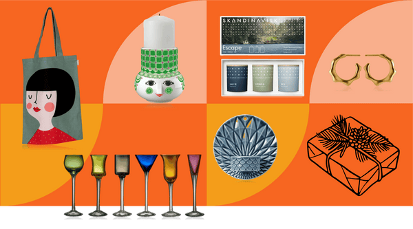 Elegant Scandinavian gifts for women including gold jewellery, designer candles and beautiful ceramics arranged on soft neutral background