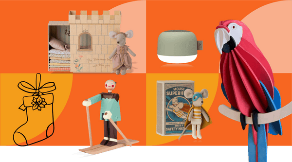 Whimsical Scandinavian children's gifts including Maileg mouse in matchbox bed and colourful wooden decorations displayed in playful arrangement