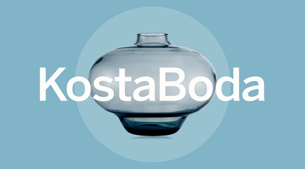 Kosta Boda logo in white over an image of a Kappa vase: Collection of Kosta Boda Swedish art glass pieces showcasing traditional craftsmanship and contemporary design from the historic glassworks
