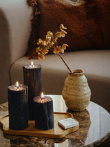 Candleit scene including Brote Alma Ceramic Vase with dried flower