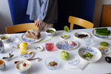 arabia moomin ceramic haru blue & white plates at table