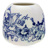Blue & white ceramic Arabia Moomin vase with floral pattern on a white background