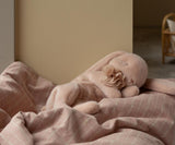plush sleeping bunny powder pink by Mailaeg Denmark on bed