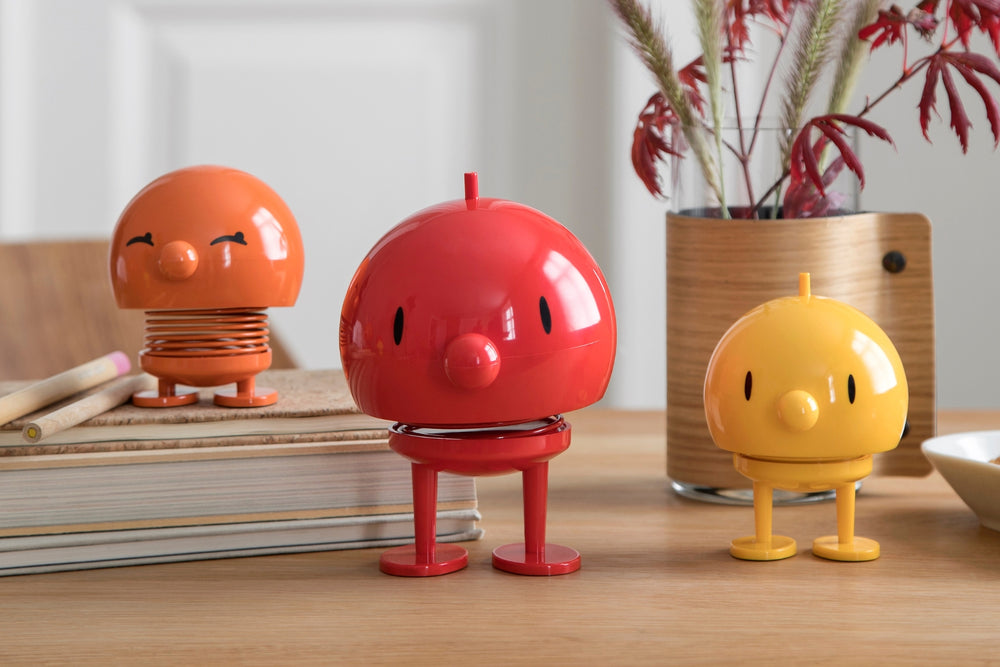3 Hoptimists, Danish bouncing ornaments, in red, orange and yellow from The Scandinavian Shop