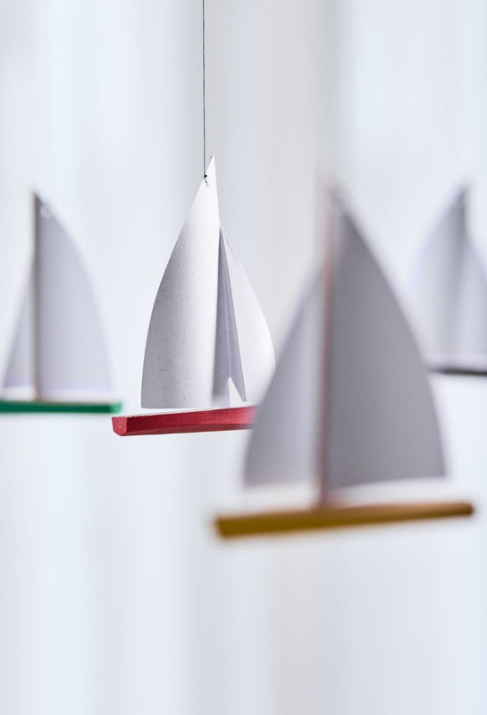 model yachts with brightly coloured hulls from Flensted Mobiles regatta mobile at The Scandinavian Shop 