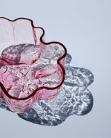 small pink Crackle vase by Kosta Boda with reflection around base