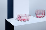 kosta boda pink crackle bowl and vase on white table